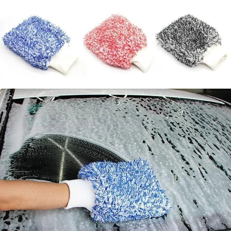 A hand wearing a blue microfiber cleaning glove is shown cleaning a car's windshield.