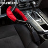 A red seatbelt is visible across a black steering wheel and interior of a car, featuring a modern gear shift and controls.