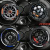 Two views of 2D car-shaped silicone coasters featuring a racing wheel hub design in black and orange.