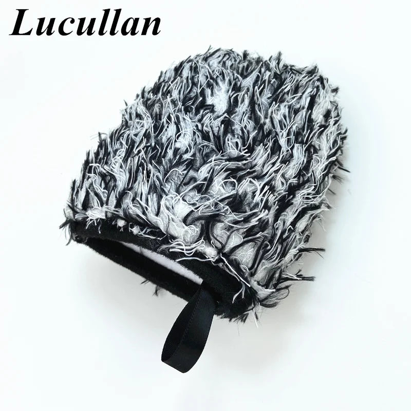 A black and white faux fur detailing wash mitt with a black grip band.