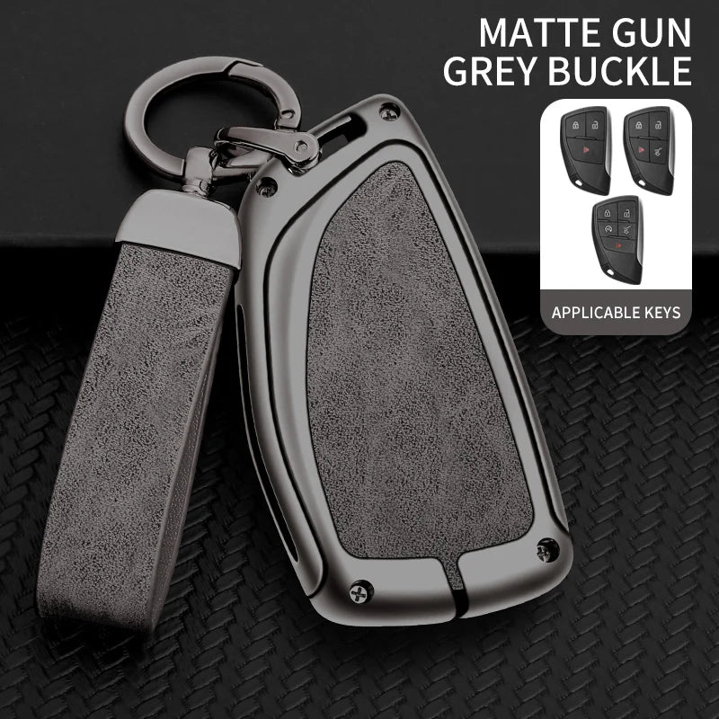 Matte grey buckle gun key case with attached strap and multiple keys