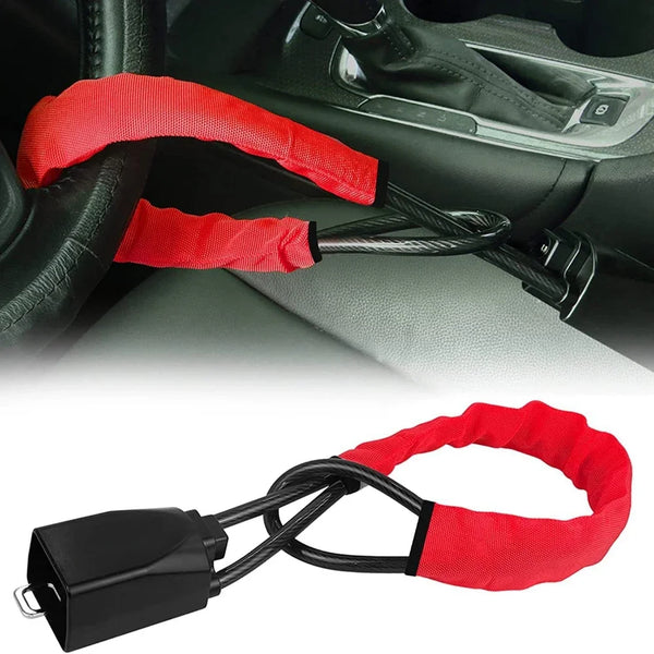 Red anti-theft lock for steering wheel and seat belt, featuring a black connector.