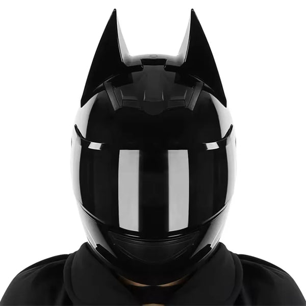 Black full face motorcycle helmet with prominent horns