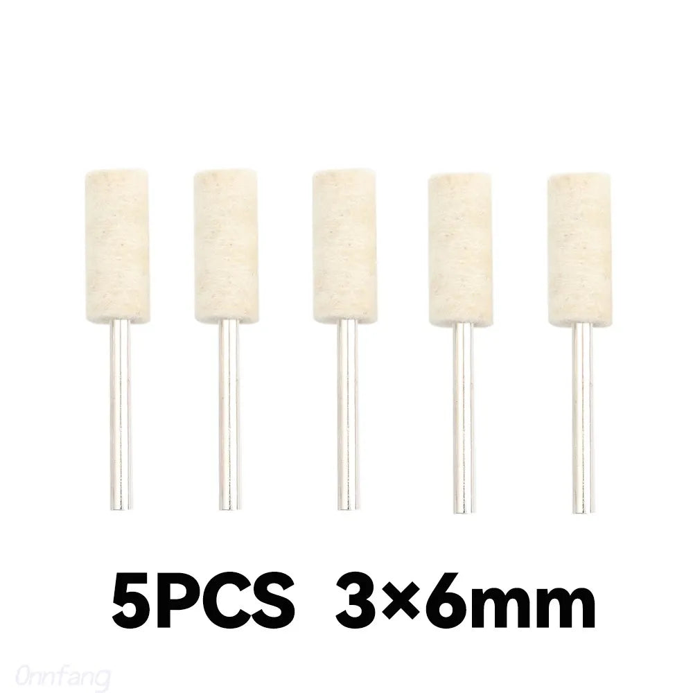 Five pieces of light beige wool felt polishing buffing wheels with 6mm diameter shafts.