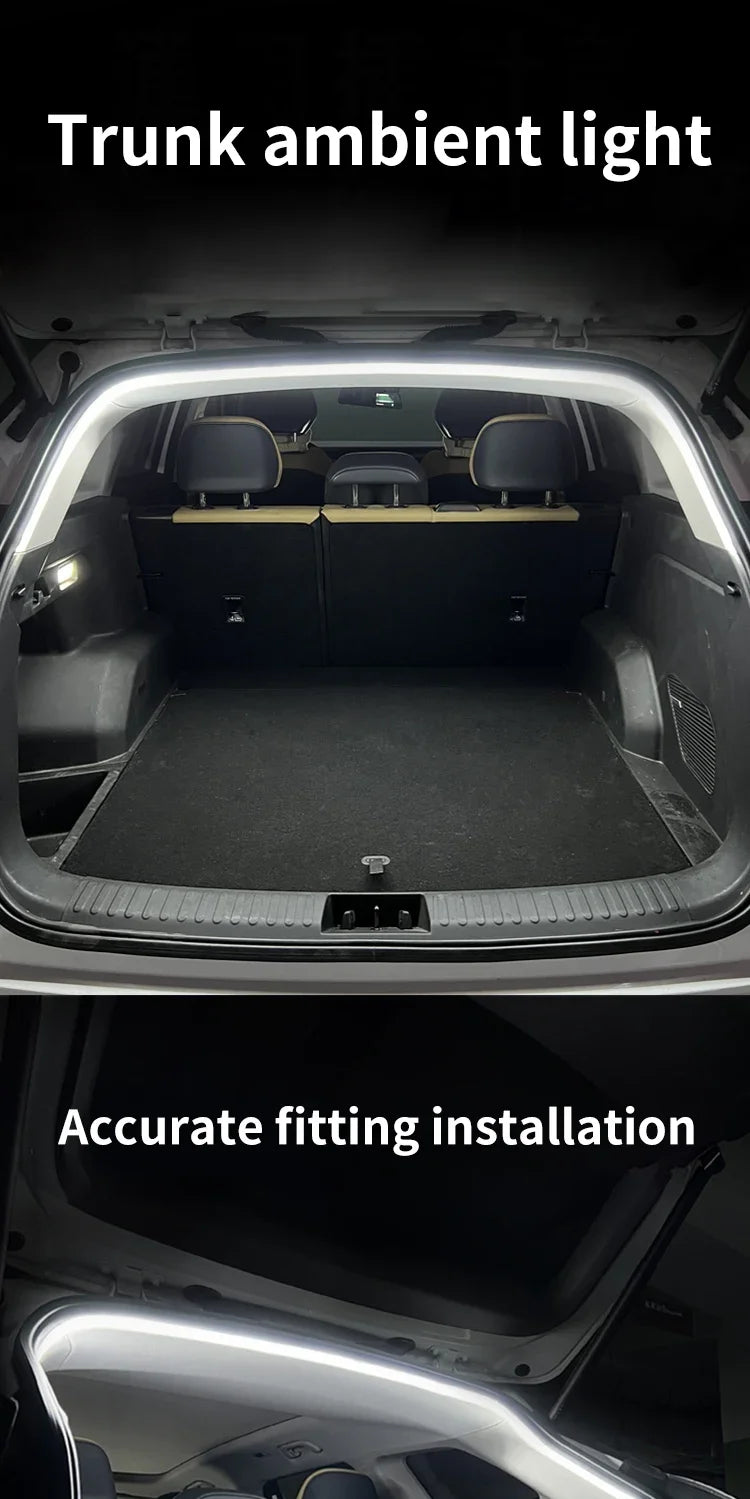 Vue intérieure du coffre d'une voiture montrant la bande lumineuse ambiante et l'assise.