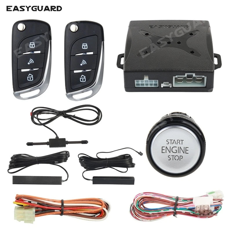 A set of remote engine start and keyless entry car alarm system components including a fob, battery, and wiring harness.
