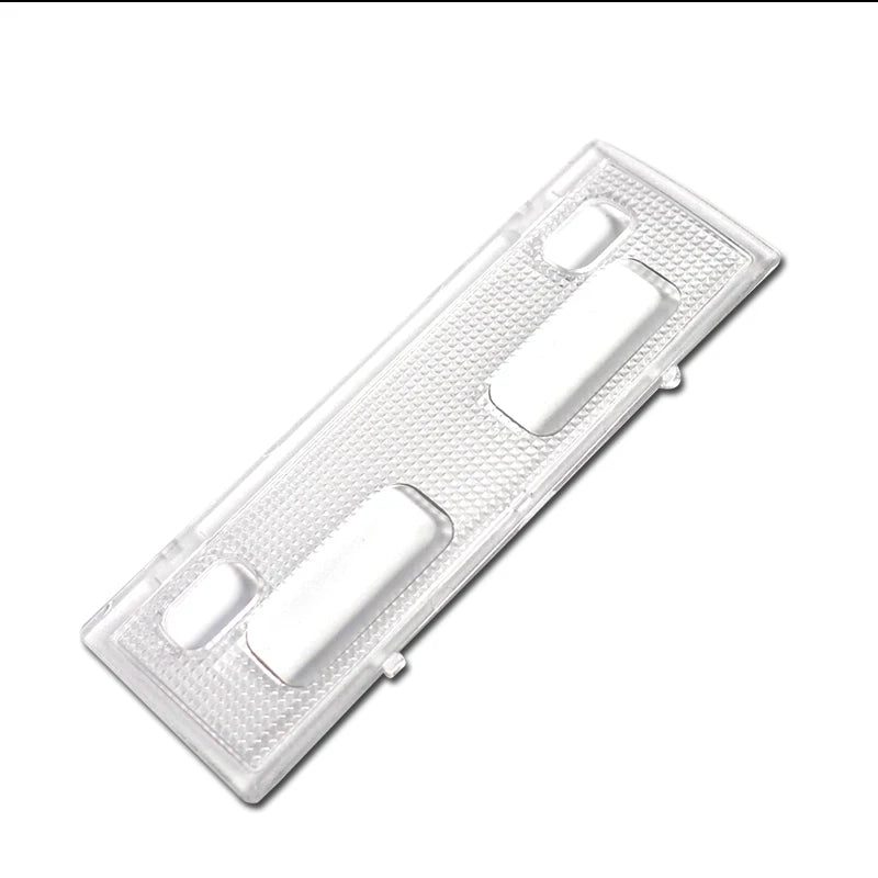 Clear replacement dome light cover for Chevy and GMC SUVs, packaged in plastic.