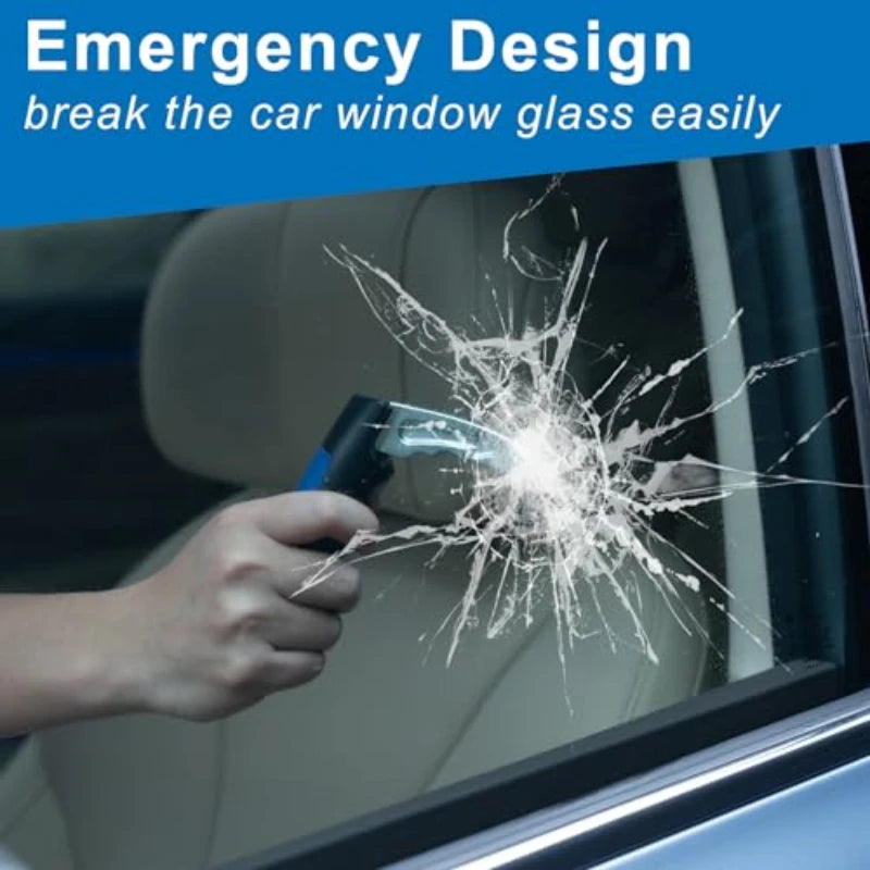 A hand is using a tool to break a spiderweb crack in a car window glass.