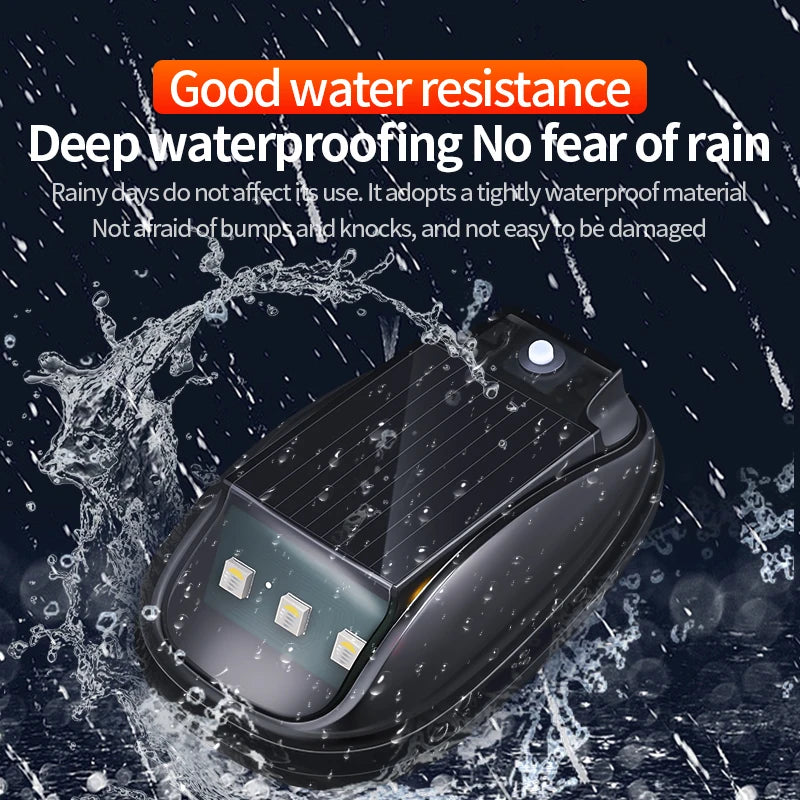 A close-up of a black solar-powered truck cab light with motion sensor, shown being washed by water droplets.