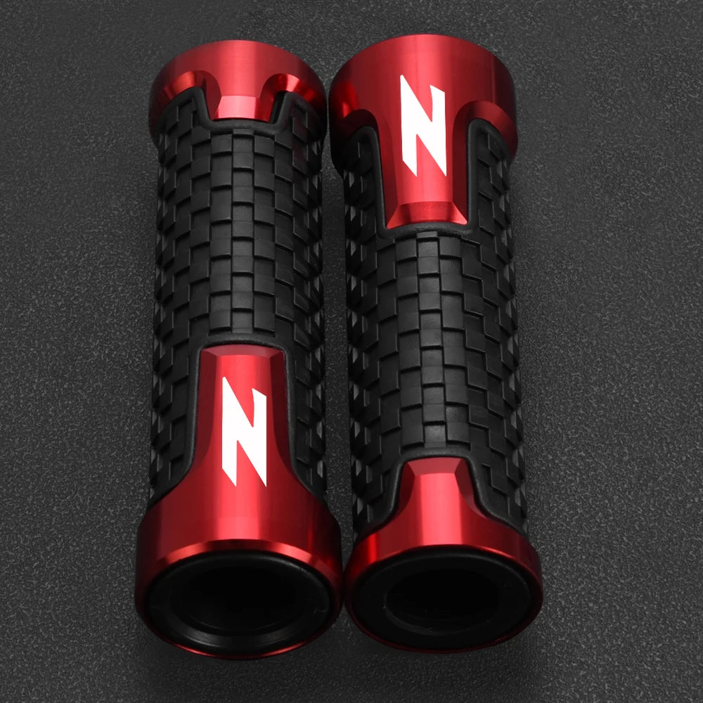 A pair of red motorcycle lever and handguard protector sets with black textured grips and white N logos.