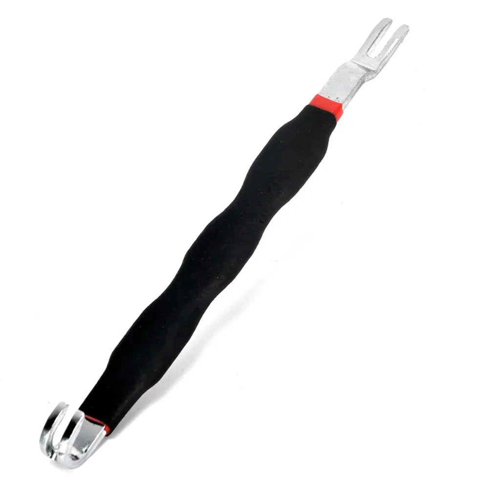 Herramienta para quitar conectores eléctricos automotrices negro y plateado con punta de pelacables.