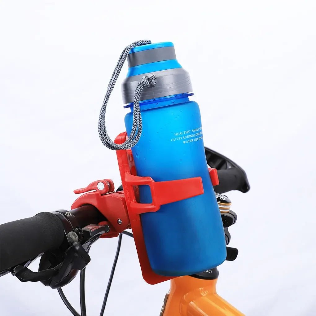 A blue water bottle is secured in an orange bicycle water bottle cage mount.