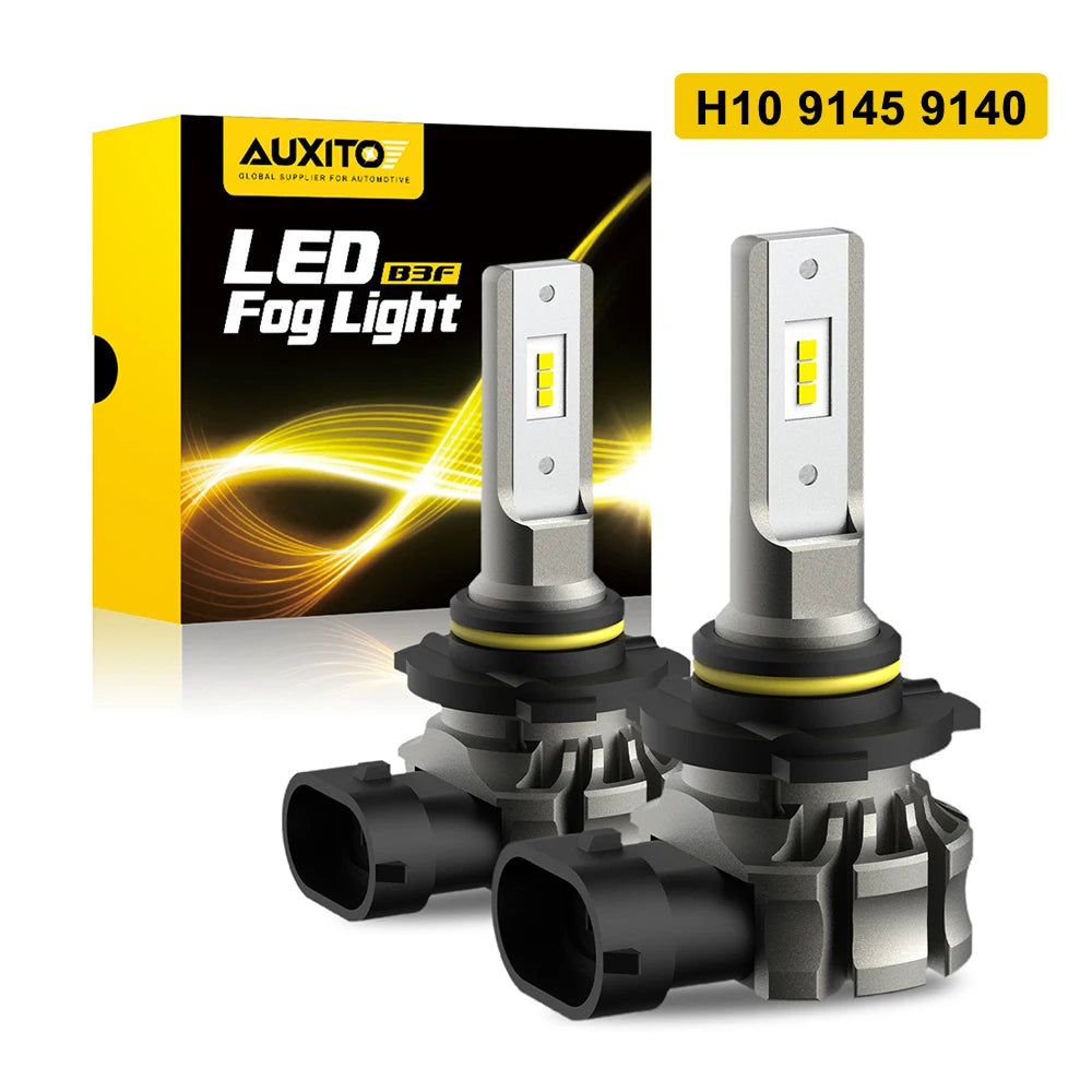 Two LED fog light bulbs with amber yellow light and silver housing are shown next to their packaging box.