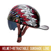 A black helmet featuring a striking design of red and white feathers with a retractable sunglass lens.