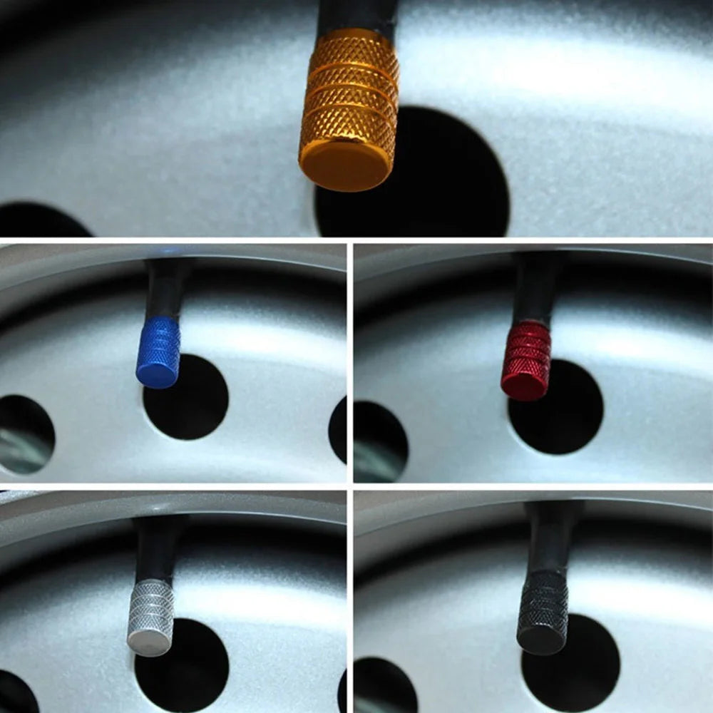 A set of aluminum tire valve caps in various colors including gold, blue, red, and silver.