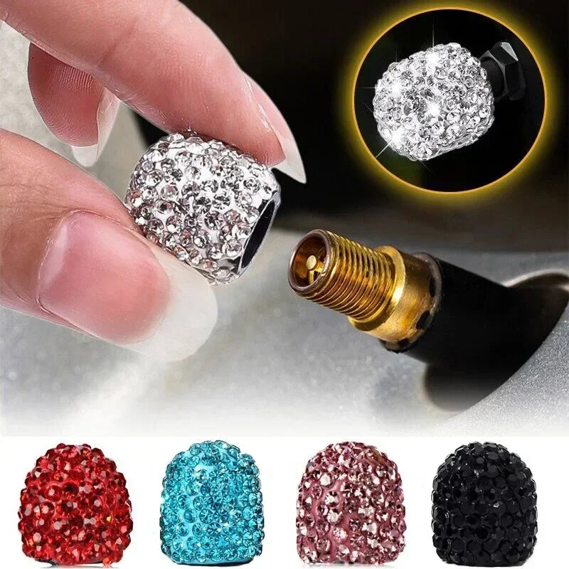A set of crystal diamond finish tire valve caps in various colors including red, blue, pink, and black.