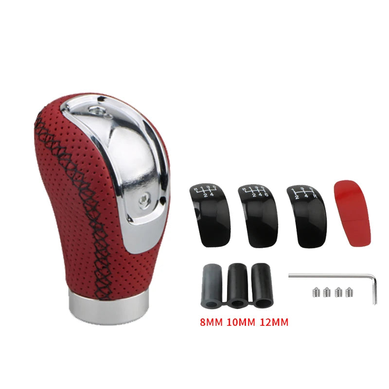 A red and silver manual gear shift knob with interchangeable black speed covers and mounting pins.