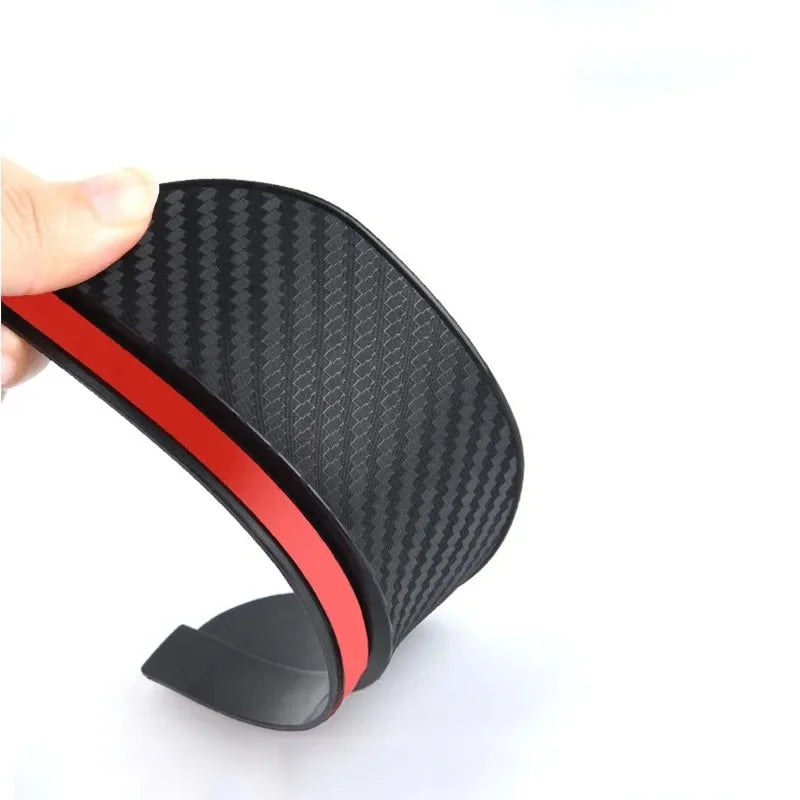 Black carbon fiber rain visor set with a red accent, shown from the side.