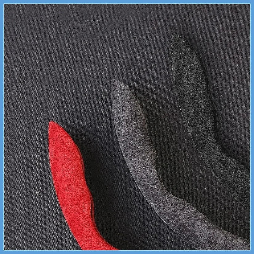 Two suede car steering wheel covers, one red and one black, shown against a dark background.