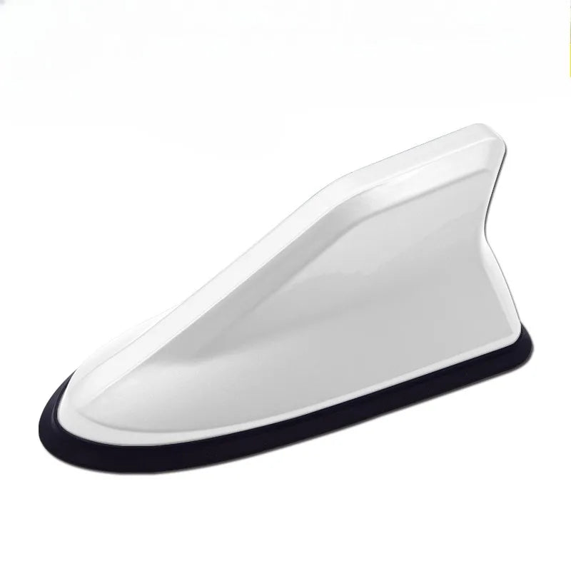 A white, aerodynamic car antenna amplifier with a black base.