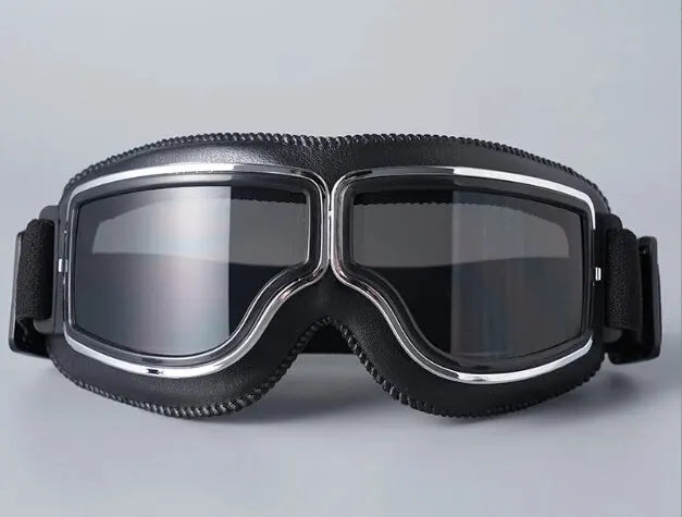 A pair of black retro folding motorcycle windproof glasses with silver accents.