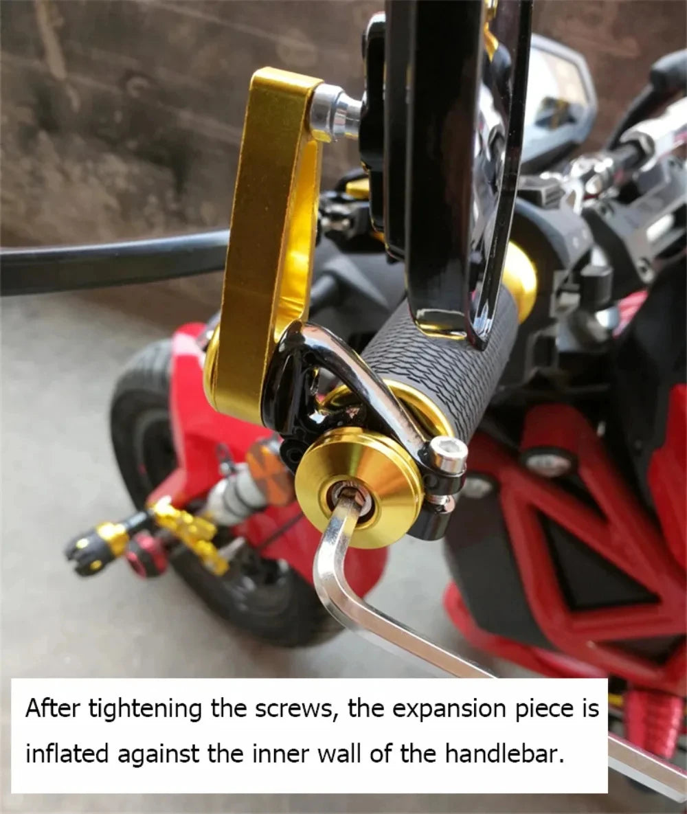 A close-up of a motorcycle handlebar with an installed rearview mirror and expansion piece being tightened.