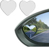 A heart-shaped rearview mirror set, featuring two heart-shaped mirrors, is shown mounted in a car window.