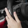 A hand is gripping a black carbon fiber texture steering wheel cover, highlighting its snug fit and durability features.