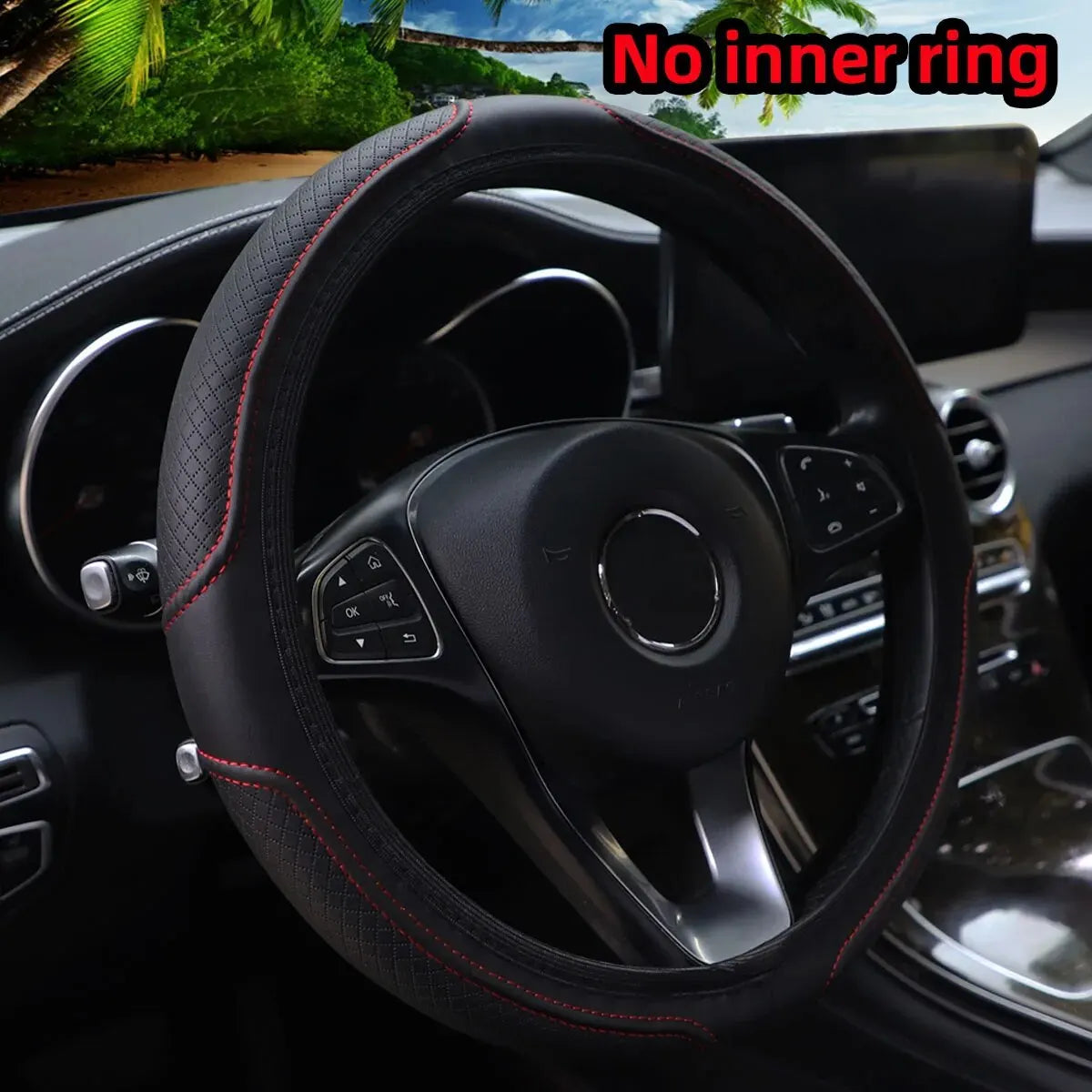 Black steering wheel with red stitching and a circular emblem, showing no inner ring.
