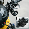 Close-up view of a black foldable motorcycle cup holder bracket mounted on a yellow handlebar.