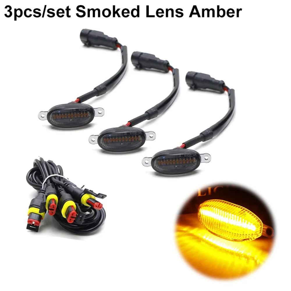 Tres juegos de luces marcadoras LED de lente ámbar ahumado para parrillas de camiones y SUVs