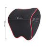 Black memory foam car headrest neck pillow with adjustable strap shown from the side.