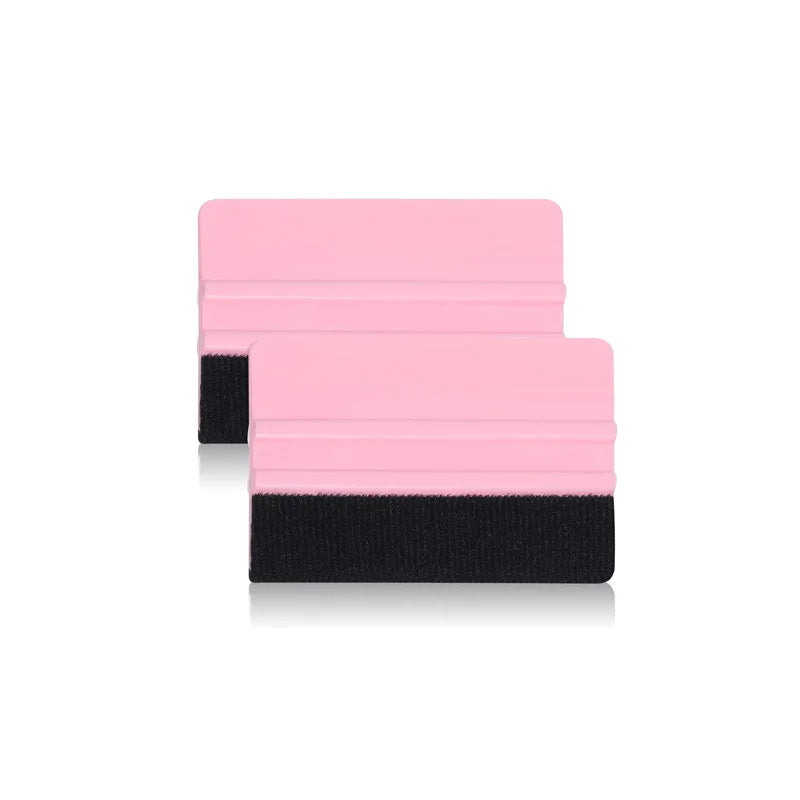 A pink and black felt squeegee tool for removing vinyl decals and film.