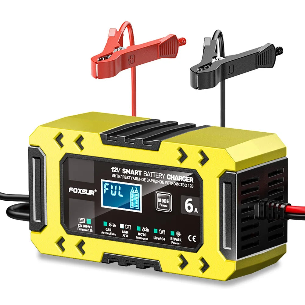 A yellow and black Foxsur 12V smart battery charger unit with red and black cables.