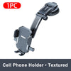A textured black cell phone holder designed for mounting on a vehicle.
