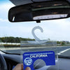 A transparent license plate holder with a hanging strap displaying the word California.