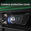A camera protective cover is shown on a car's exterior, covering the camera lens.