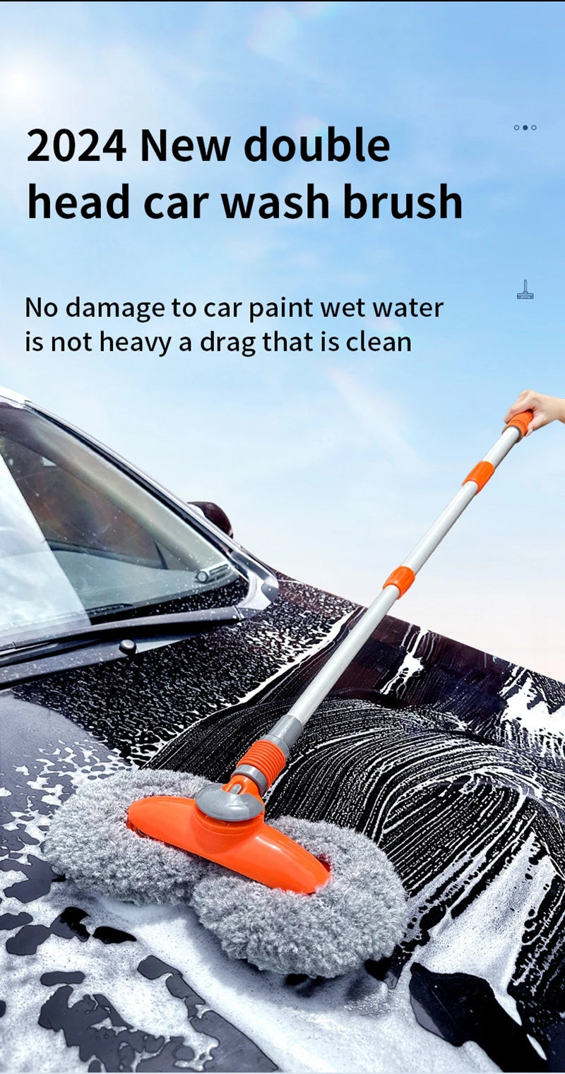 An orange telescopic car washing brush is shown cleaning a car's paint with water.