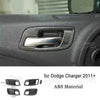 Carbon fiber trim pieces for Dodge Charger interior door panel, made of ABS material.