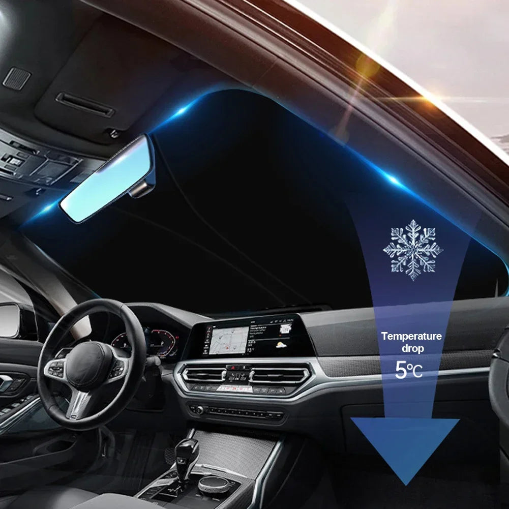 Interior view of a car showing a blue light effect on the windshield and a temperature drop indicator.