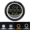 A circular black LED headlight assembly with multiple bulbs and a clear lens.