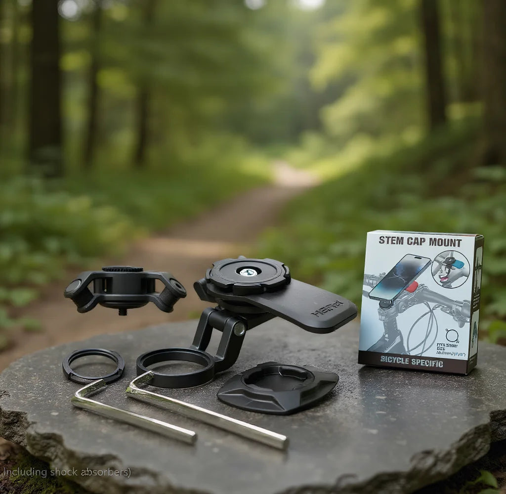 A black universal motorcycle phone mount is displayed on a stone, next to its packaging.