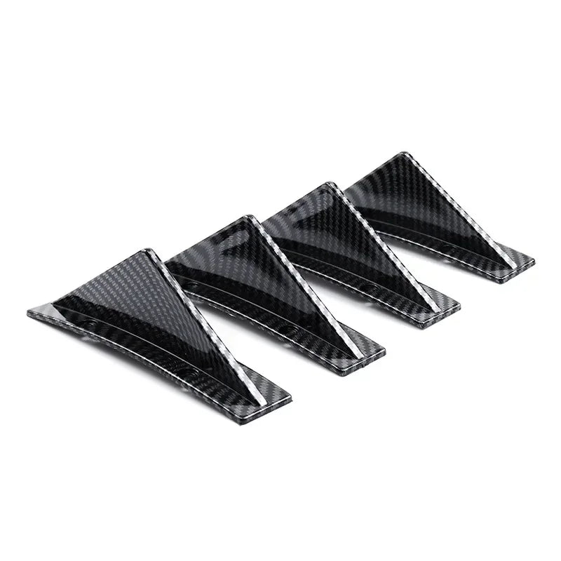 Black ABS plastic universal rear bumper spoiler lip kit shown from a slight angle.