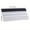 A precision scratch-free decal applicator tool with a black top and multiple white strips for applying decals.