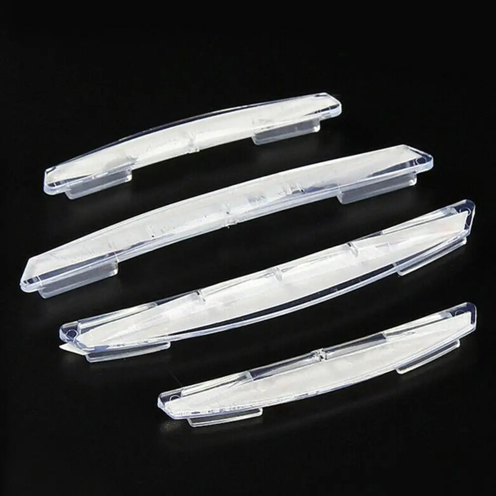 A set of four clear plastic car door edge protector strips for anti-scratch guard trim.