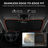 Interior view of a car showing a seamless edge-to-edge sunshade installed on the windshield.