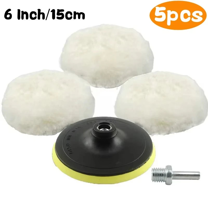 Five white wool polishing pads and a mounting screw for auto detailing