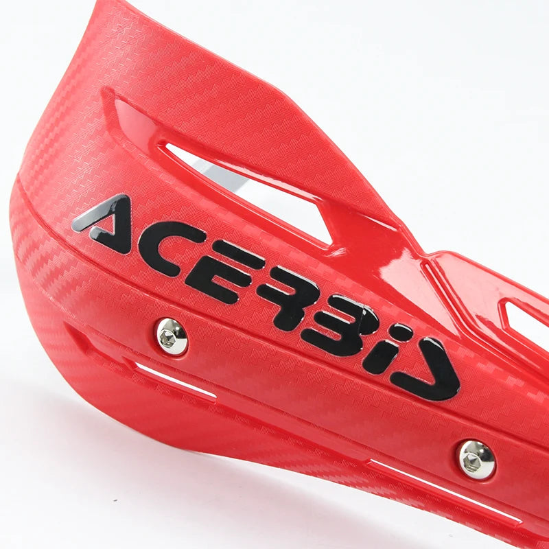 A red motorcycle handguard protector for dirt bikes with black lettering and carbon fiber texture.