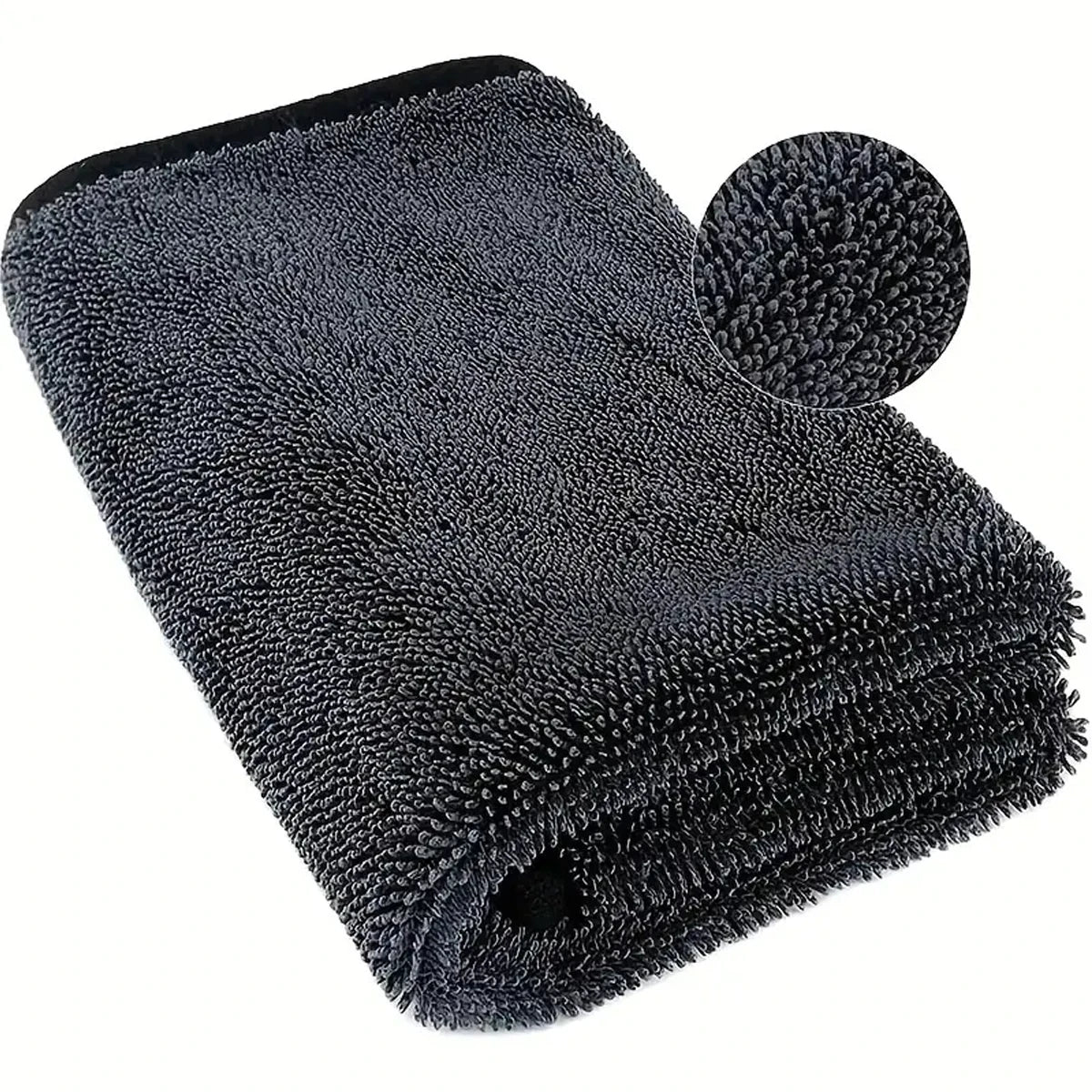 A black microfiber car drying towel with a circular sponge attached, shown from above.