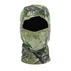 A camouflage green and black stretchy balaclava cap worn on a head.